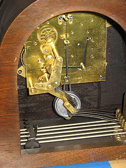 Seth Thomas number 124 Westminister chime clock movement in case with chime rods